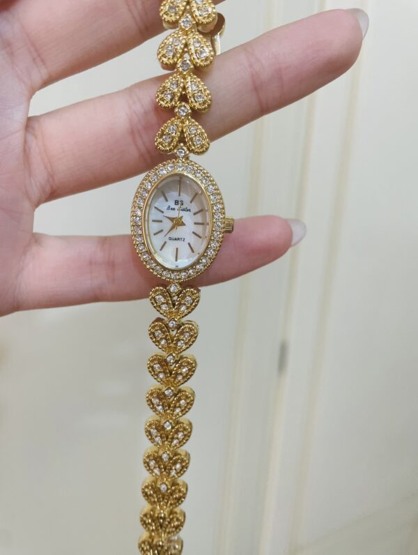 Orologio dorato acciaio
